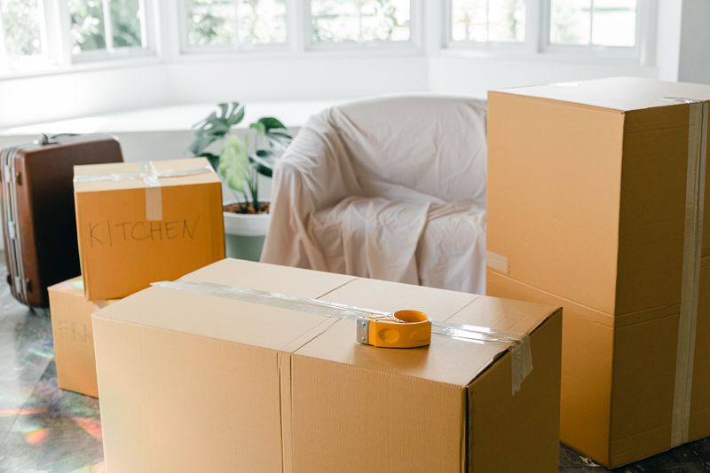 Bright room with moving boxes, ready for move-out cleaning